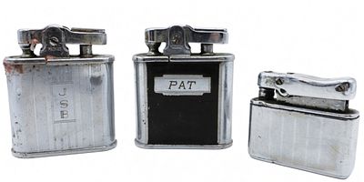 Three Vintage Chrome Pocket Lighters (2 Ronson). Group of three chrome-finish pocket lighters 