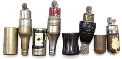 (4) Vintage Novelty Lighters - Coca-Cola plus. Collection of four vintage novelty lighters in 
