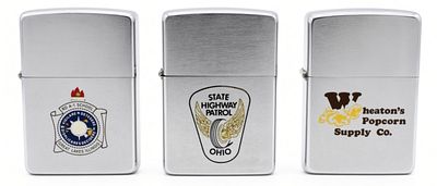 3 Zippo Advertising Lighters, Mixed Years. Three Zippo lighters spanning multiple production 