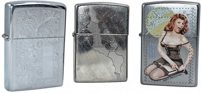 Three Zippo Lighters- Fired. Three used Zippo lighters showing signs of firing with worn flint 