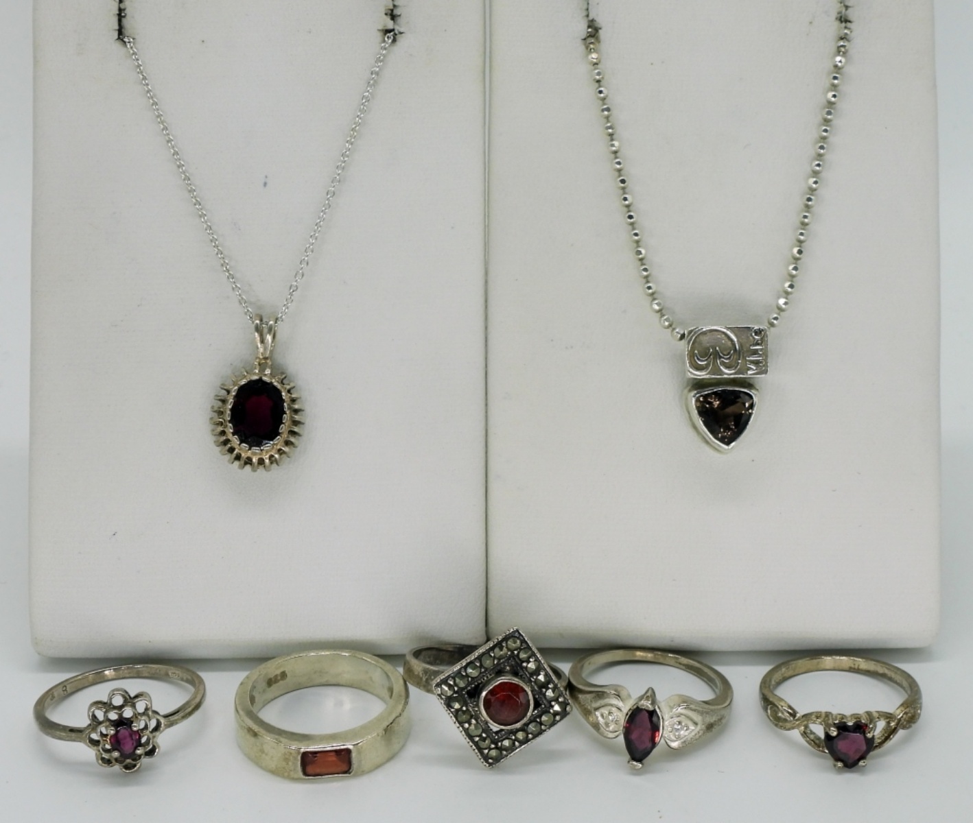 Seven Sterling Garnet Rings & Necklaces