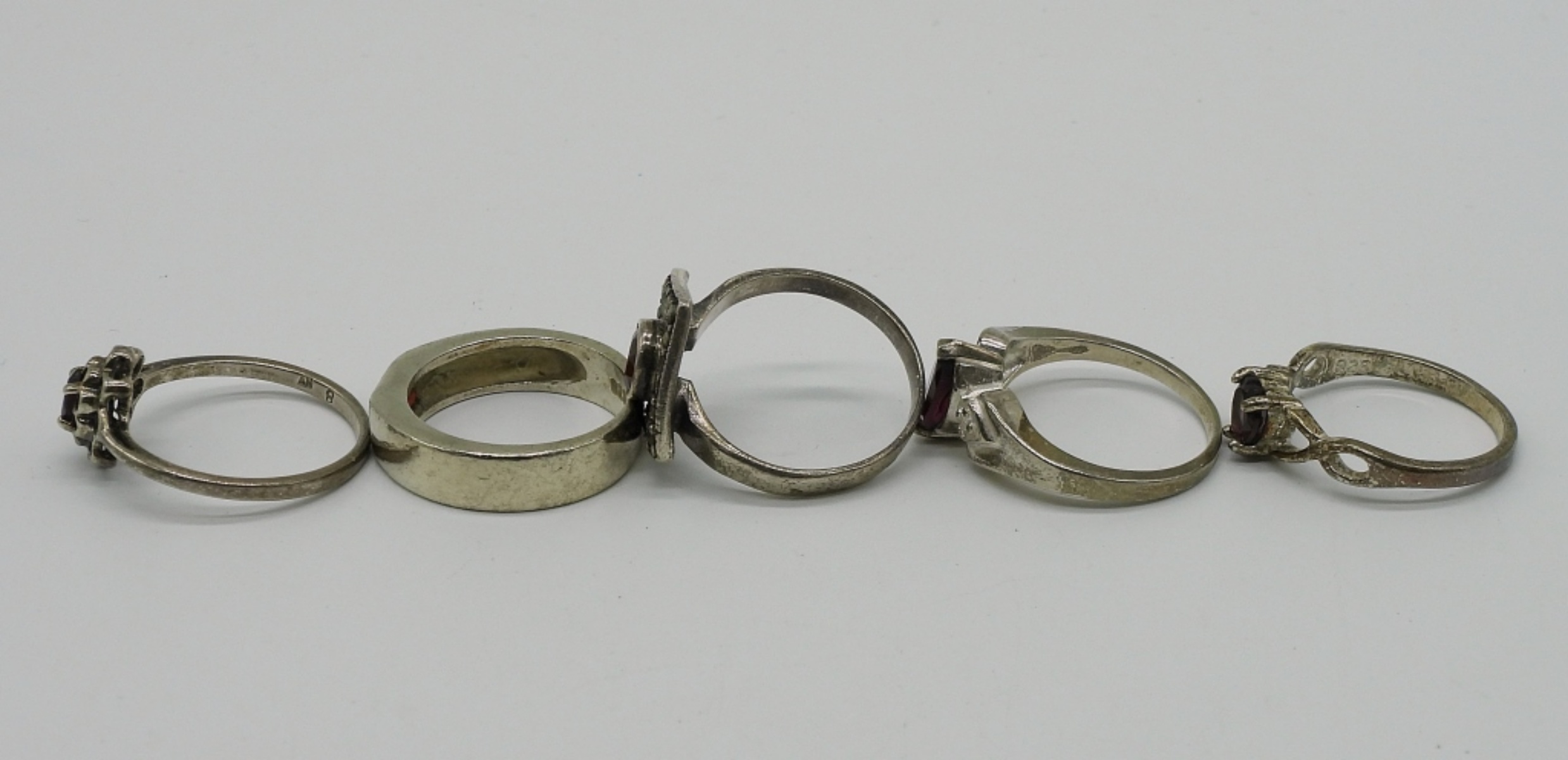 Seven Sterling Garnet Rings & Necklaces