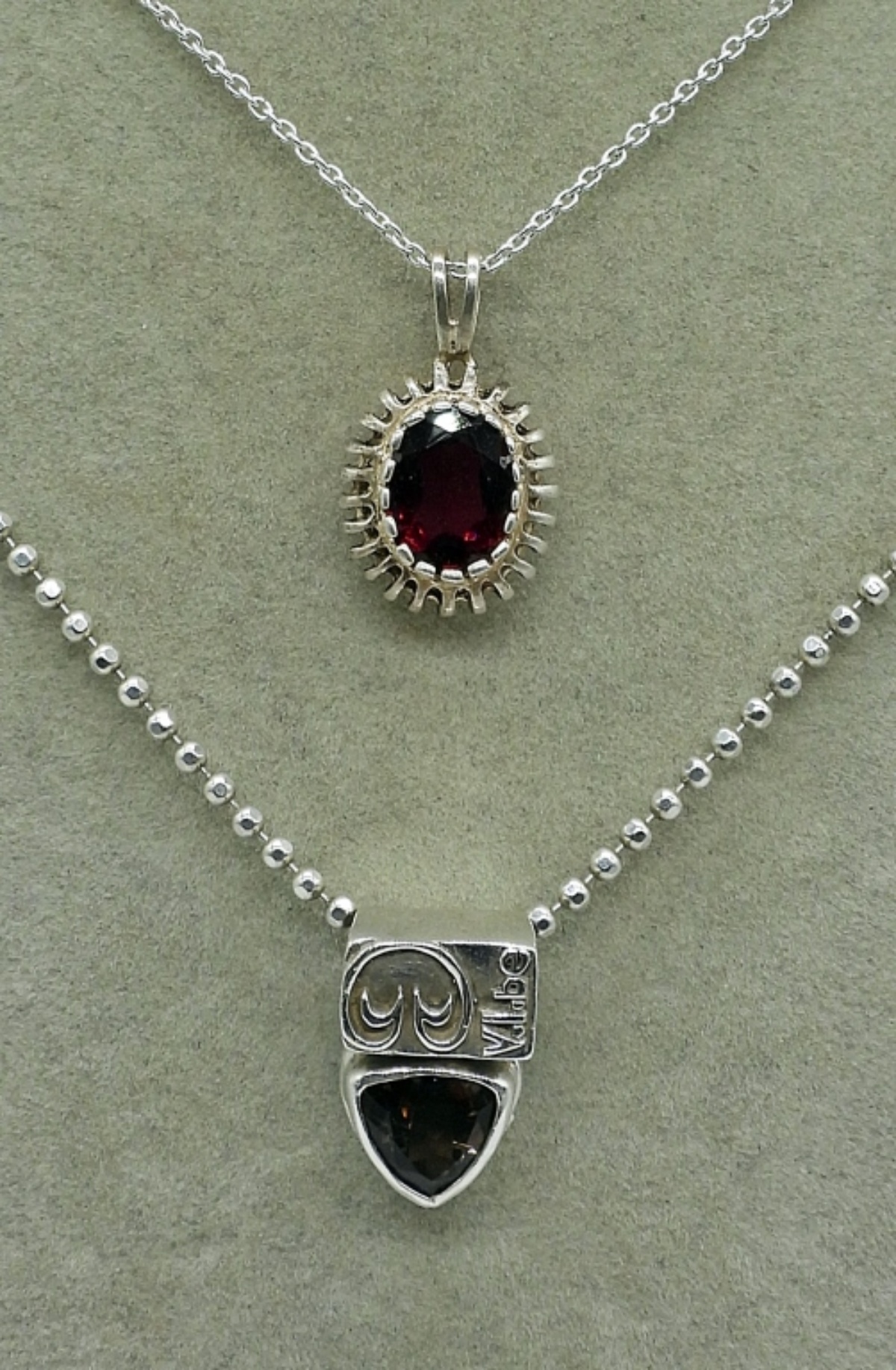 Seven Sterling Garnet Rings & Necklaces
