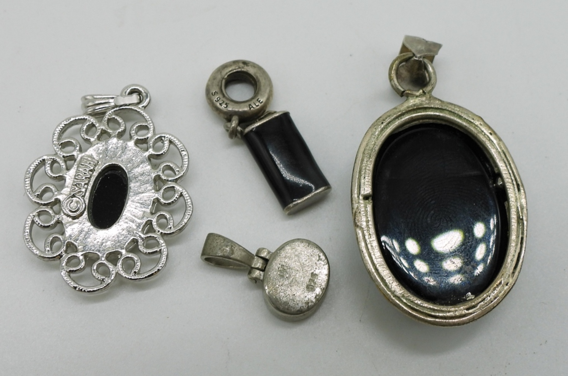 Four Sterling, Black Onyx Pendants