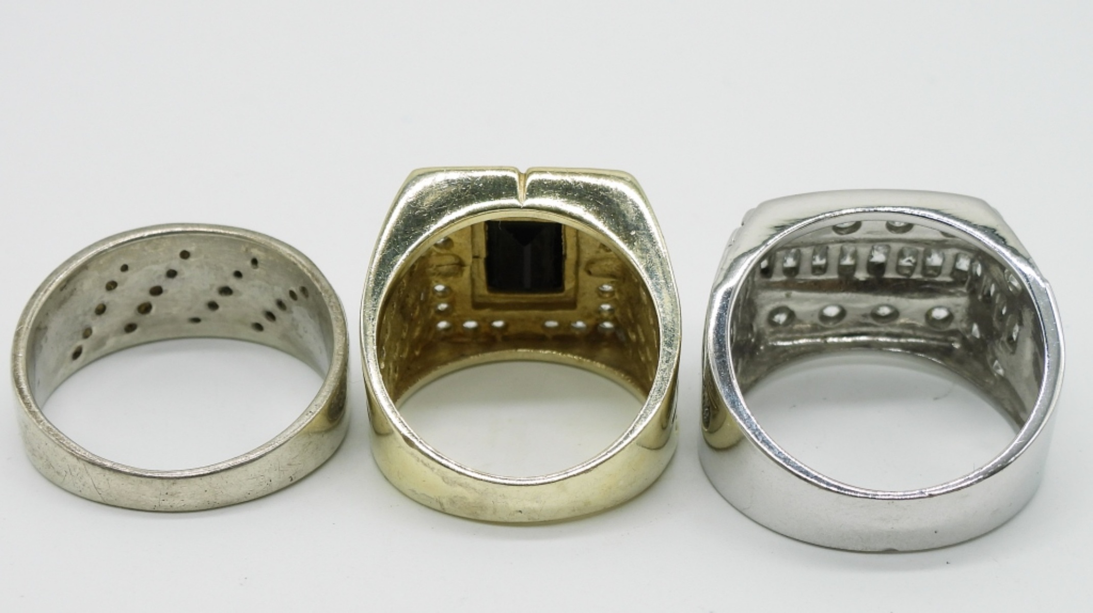 Three Sterling Rings with Clear Stones