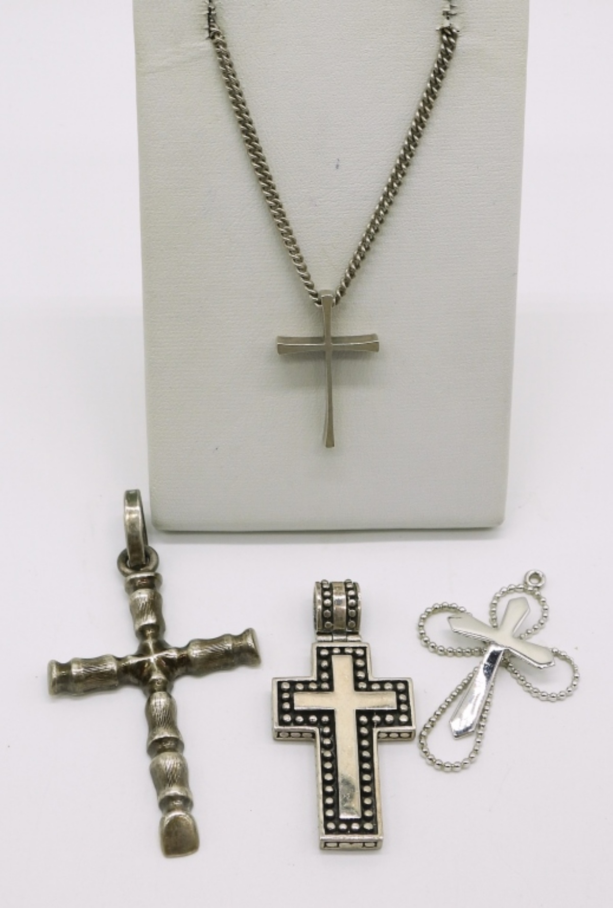 Four Sterling Cross Pendants & Chain