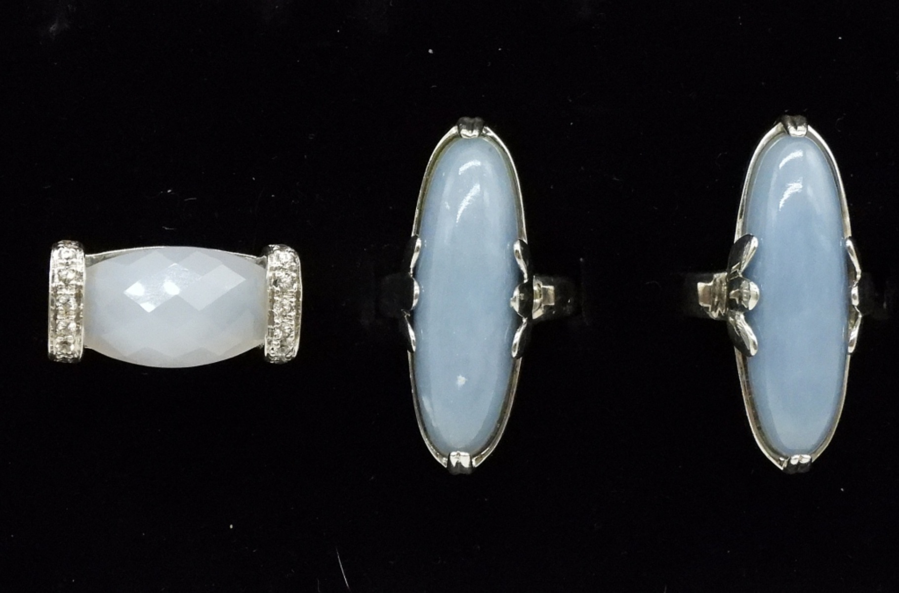 Three Sterling Rings with Blue Gemstones