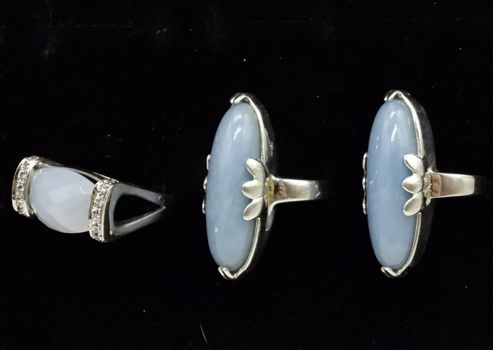 Three Sterling Rings with Blue Gemstones