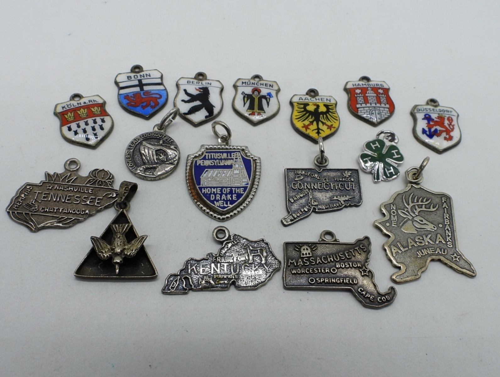 16 Vintage Sterling Charms