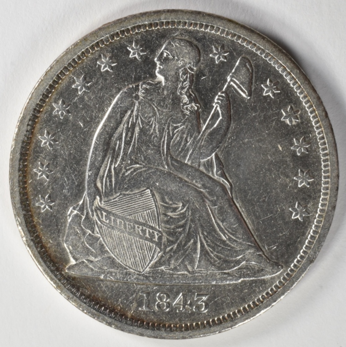 1843 Seated Dollar