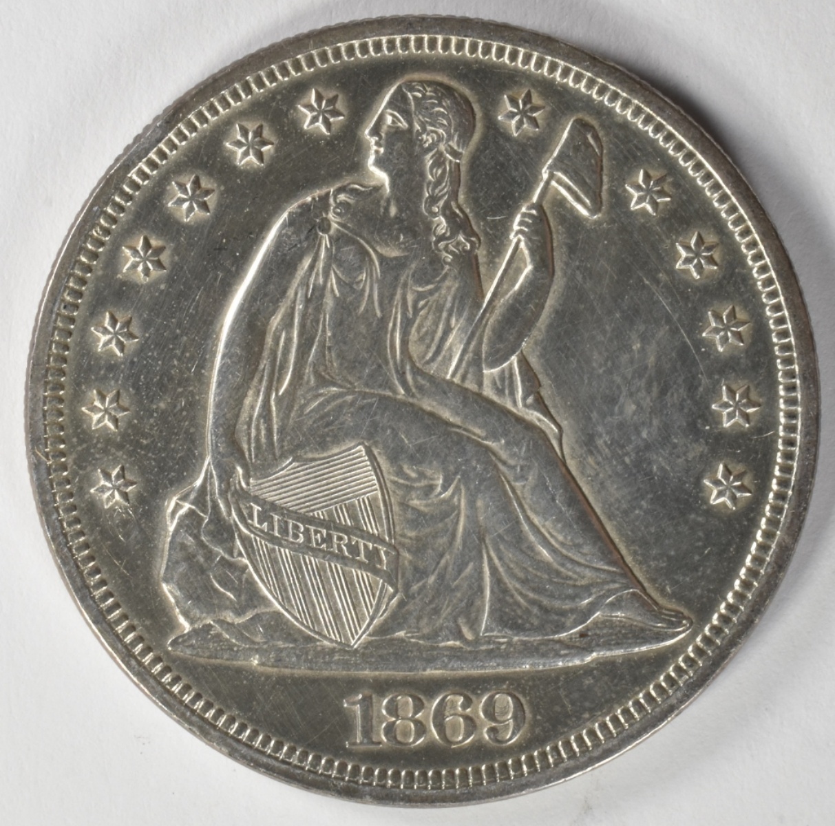 1869 Seated Dollar