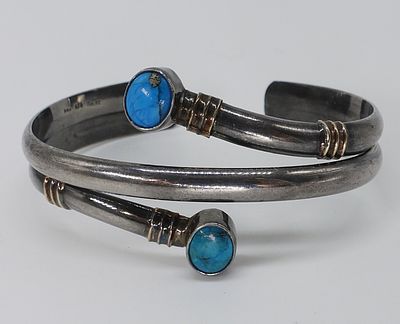 Sterling & 14K Accented, Turquoise Cuff Bracelet. Turquoise gemstones bezel set in sterling 