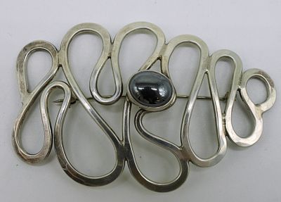 Sterling Hematite Brooch. Sterling hematite brooch, 3" x 2". Marked "STG PJ". 12 DWT