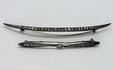 2 Vintage Sterling Rhinestone Brooches. Two vintage sterling rhinestone brooches. 3" and 4". 6.5 DWT