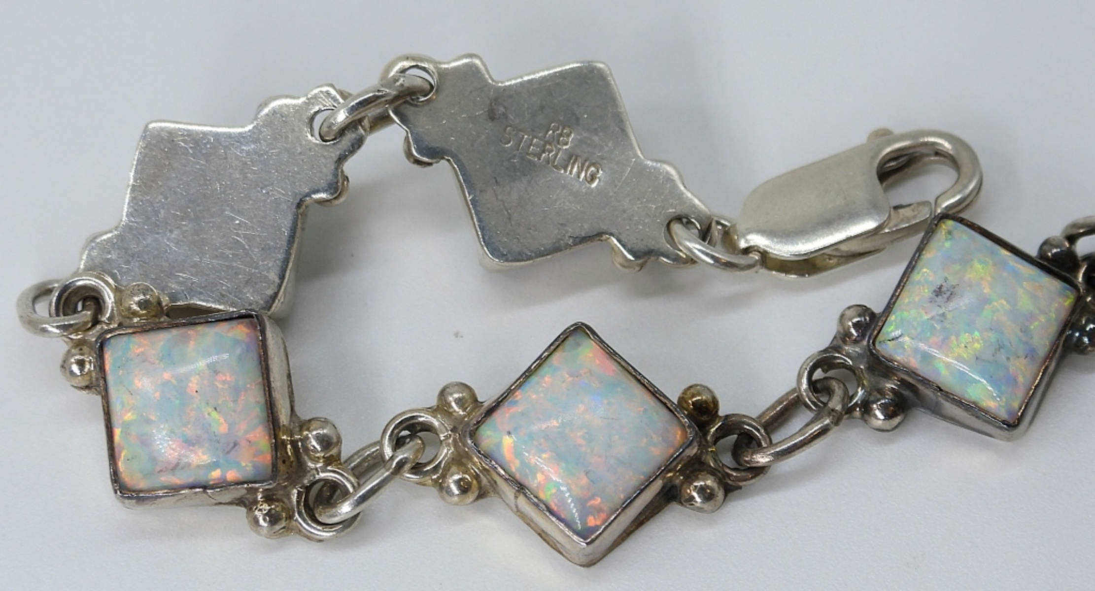 Four Sterling Opal Necklaces, Bracelet & Pendant