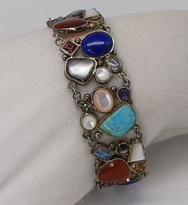 Multi Gemstone Bracelet in Sterling. Sterling 7.5 inch bracelet with a variety of gemstones. 22 DWT