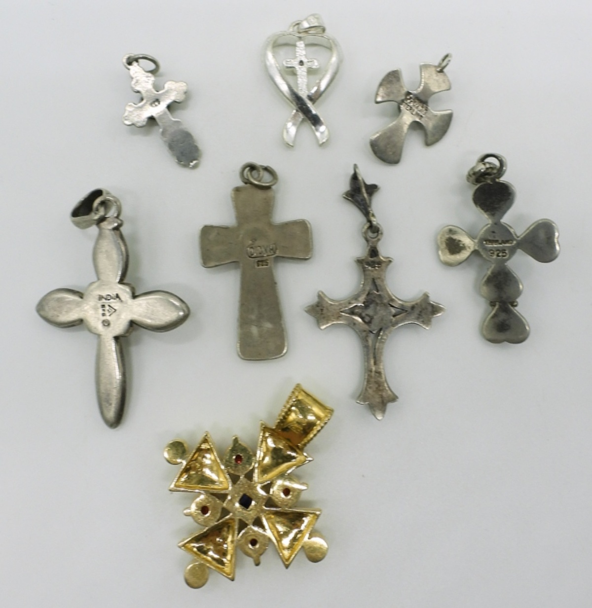 Eight Sterling Cross Pendants