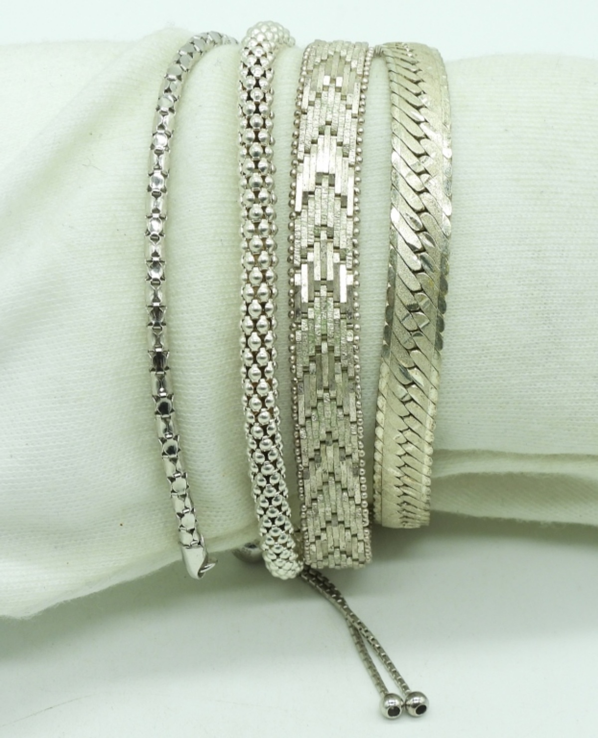 Four Sterling Bracelets