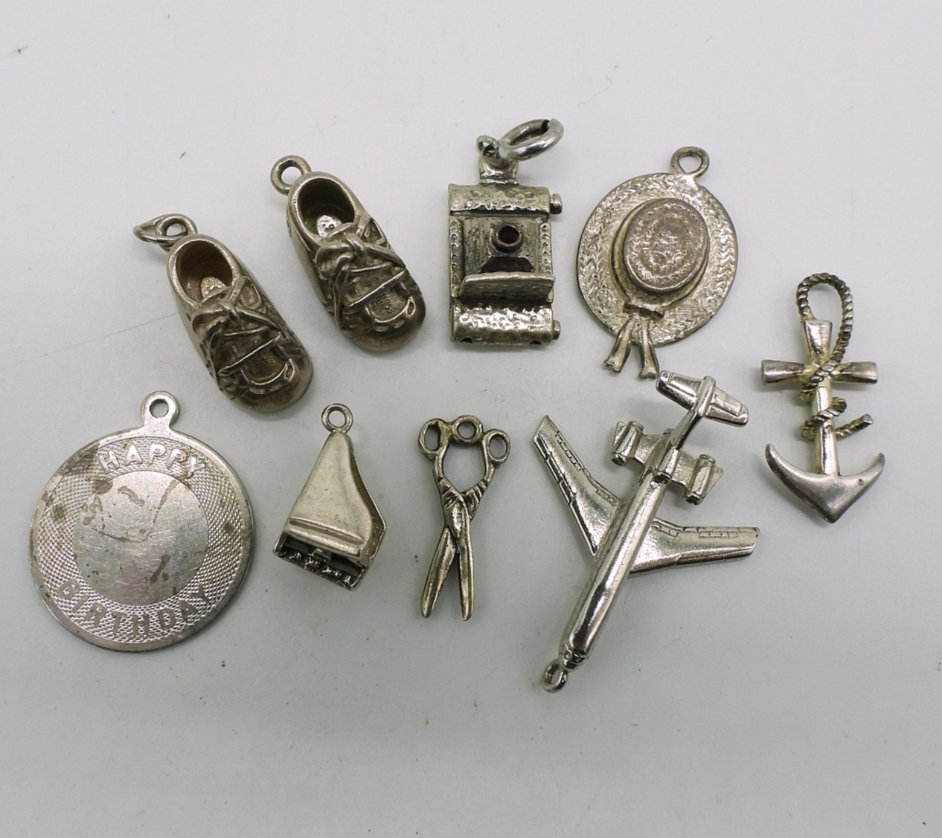 9 Vintage Sterling Charms