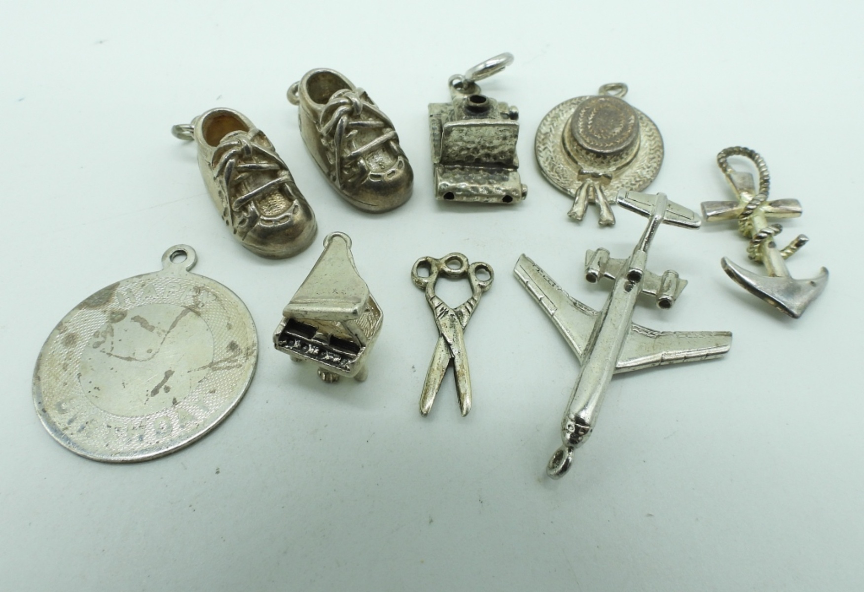 9 Vintage Sterling Charms