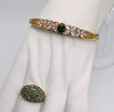 Gold Tone 925 Simulated Emerald Set. Gold tone sterling, hinged bangle bracelet with simulated 