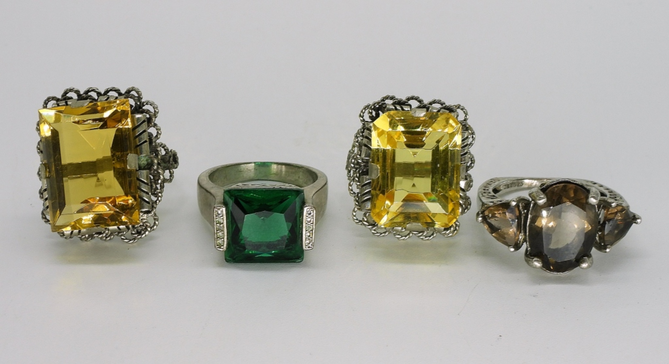 Four Sterling Gemstone Fashion Rings