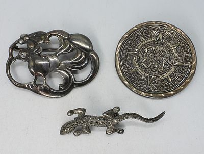 3 Sterling Brooches. Three sterling brooches, 2". 20.7 DWT