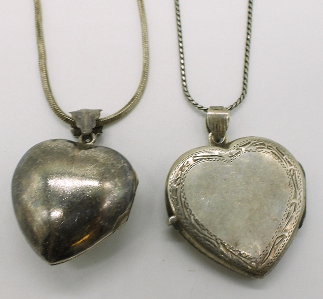 Two Sterling Heart Lockets on Long Chains