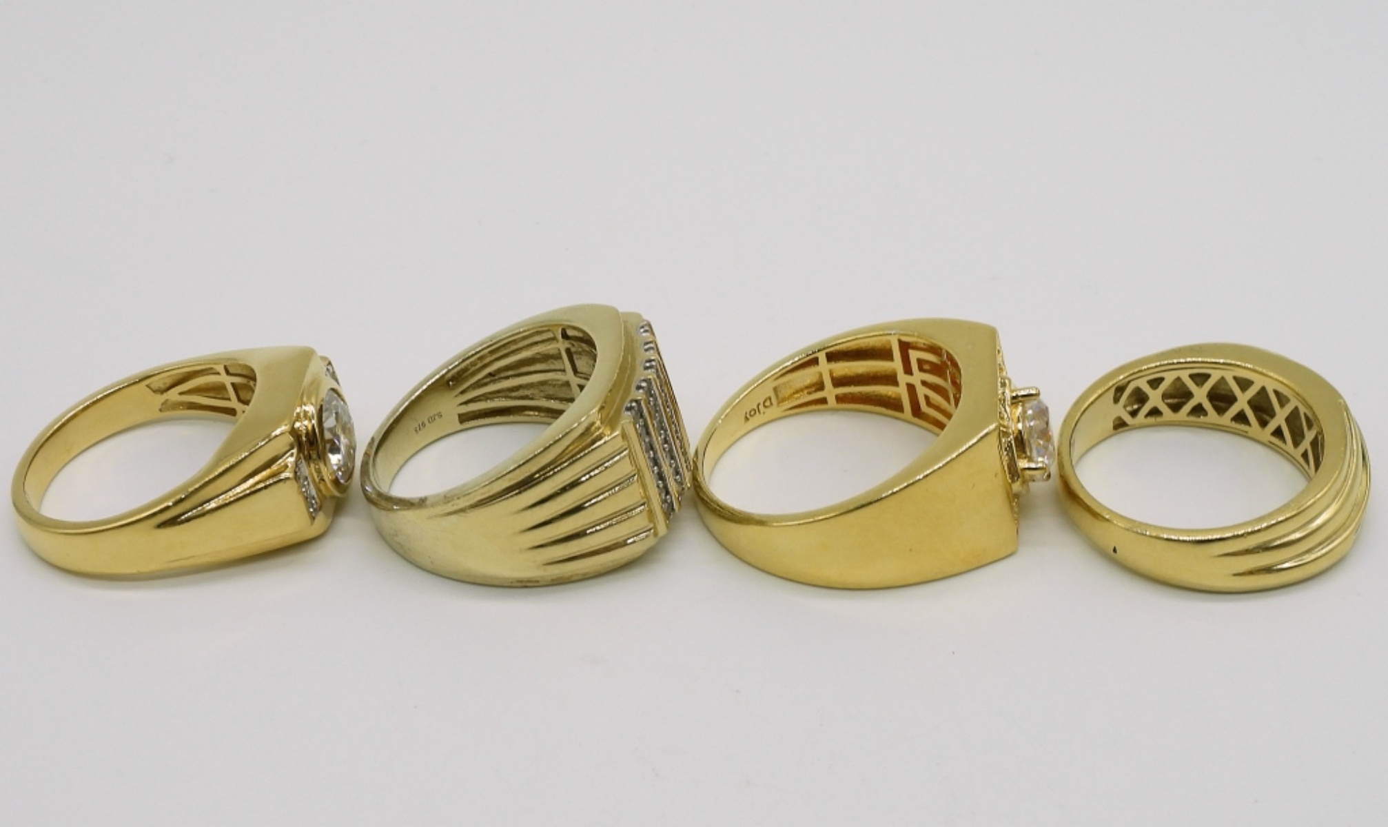 Four Gold Tone Sterling Chunky Rings