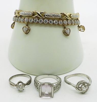 Simulated Diamond Tennis Bracelets & Rings. Two sterling, gold tone tennis bracelets with 