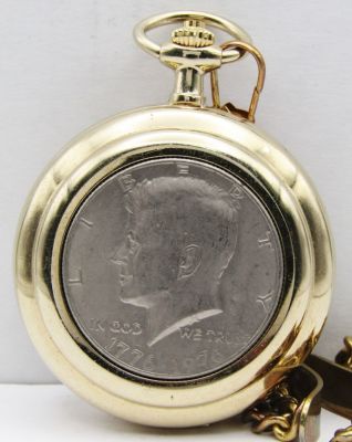 CALIBRI 1976 KENNEDY 50c QUARTZ POCKET WATCH. UNTESTED NEEDS BATTERY