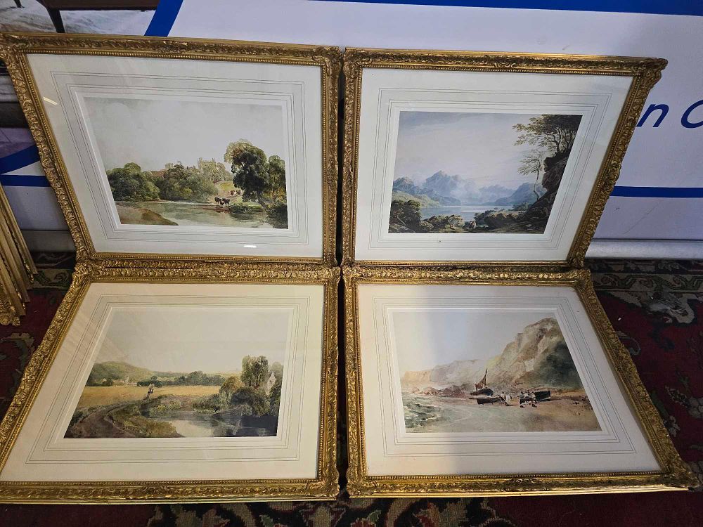 Lot 324: * This set of four framed and glazed landscape prints are reproductions after original works by the
