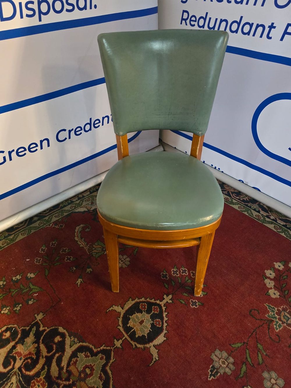 Lot 459: * A pair of sage green leather side chairs reminiscent of the classic bentwood style pioneered by
