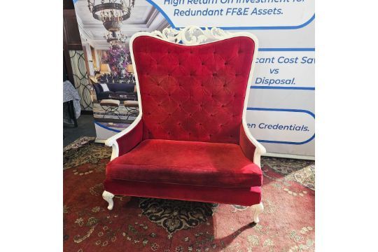 Lot 770: * A Baroque style high back sofa upholstered in red velvet with tufted back sat on a white painted