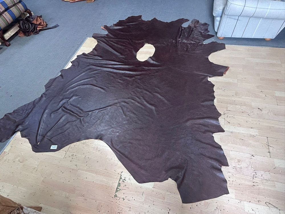 Lot 243: * Hide 100% leather tanned cow hide Gibson Coffee Bean 5.82m Ref MG04 (with some inperfections)