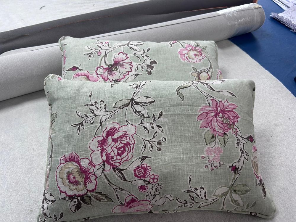 Lot 168: * Cushions A pair scatter cushions in green pink floral design with feather interior