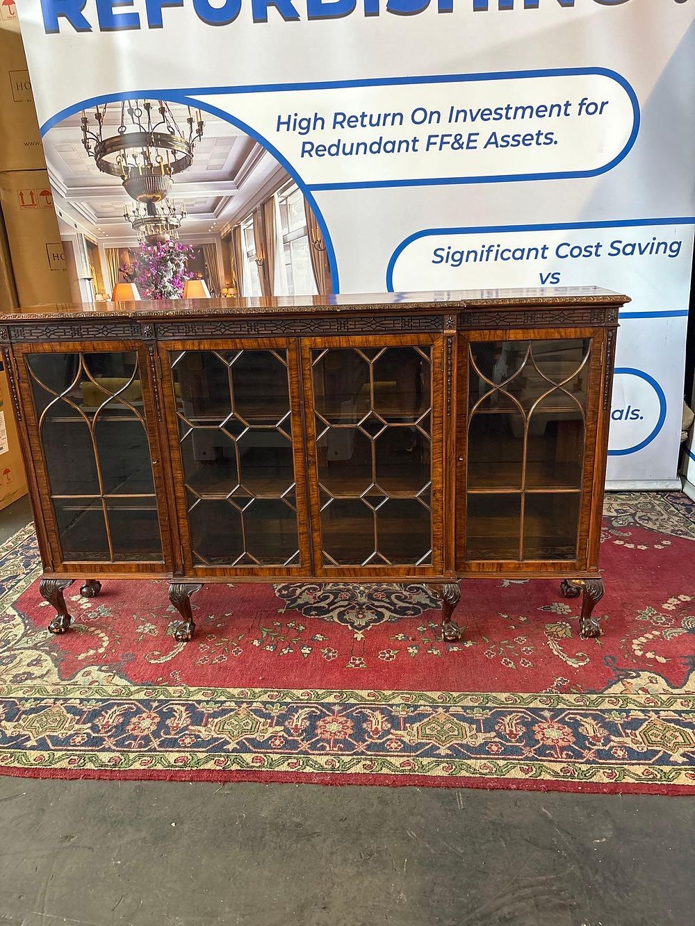 Lot 352: * A stunning Chippendale Style Mahogany Breakfront Glazed Bookcase