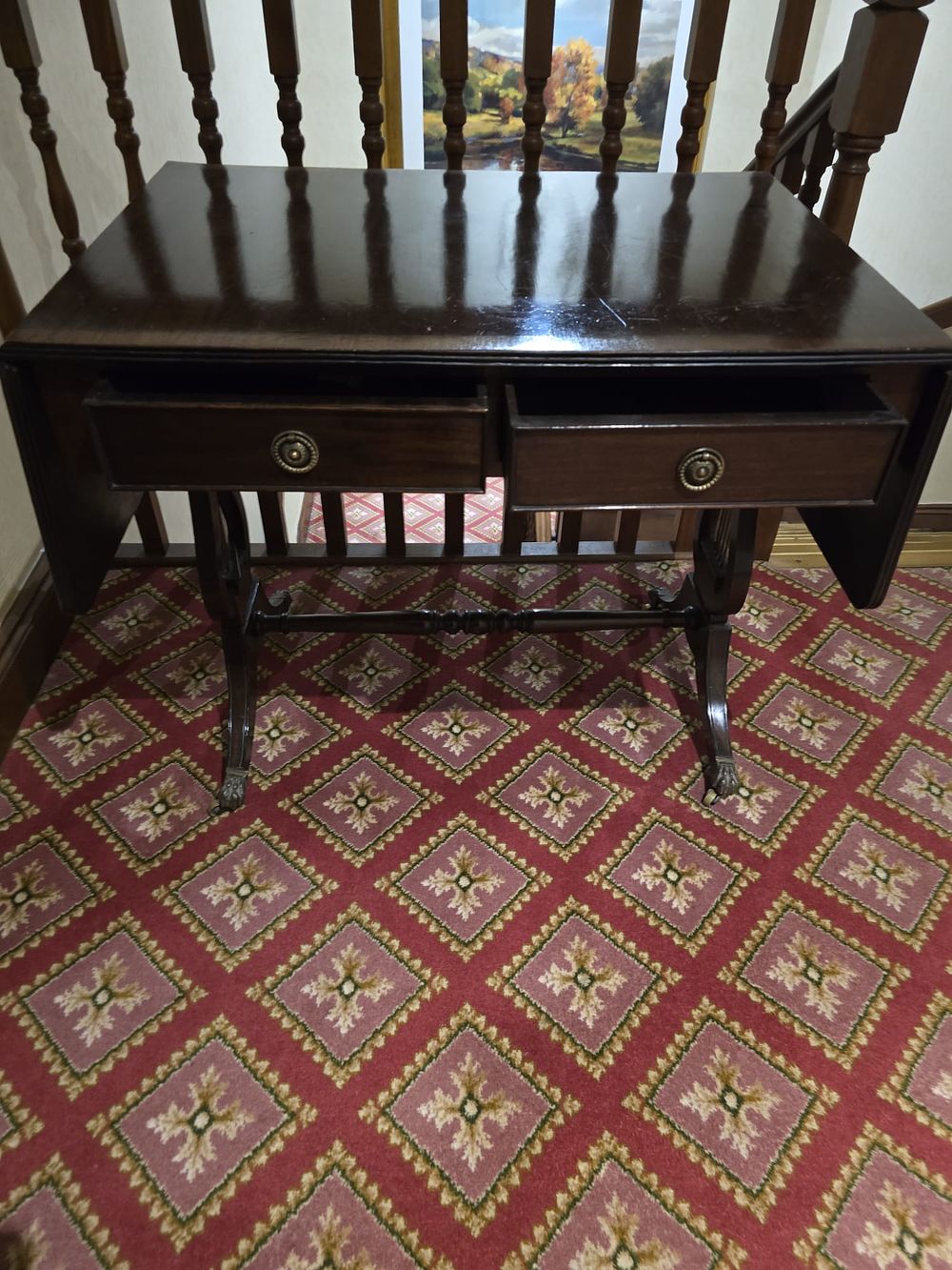 Lot 443: * A two drawer mahogany table on lyre supports with cast brass cap feet 88 x 63 x 75cm