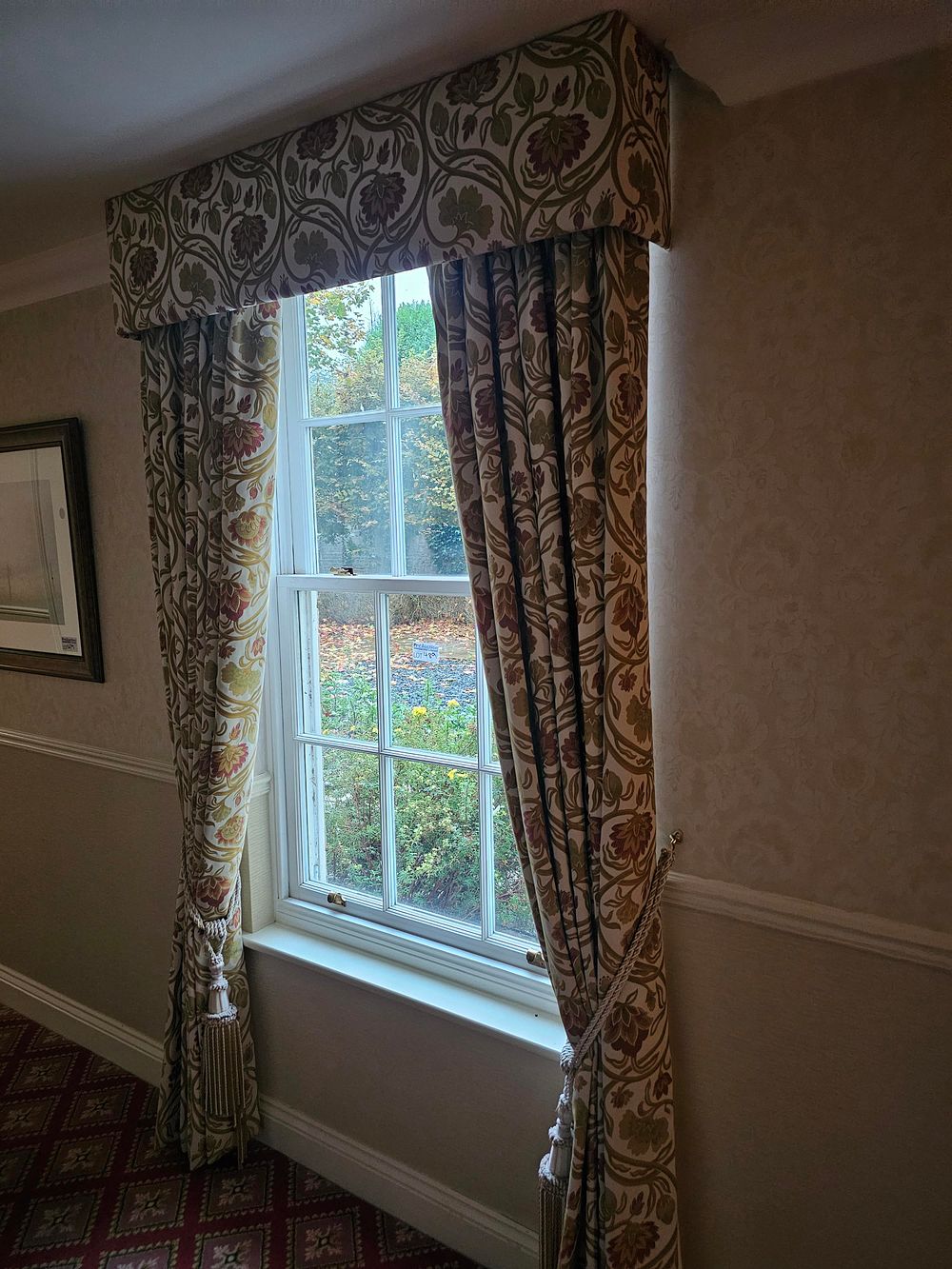 Lot 489: * A pair of fully lined cotton floral fabric drapes span 120cm x 240cm drop