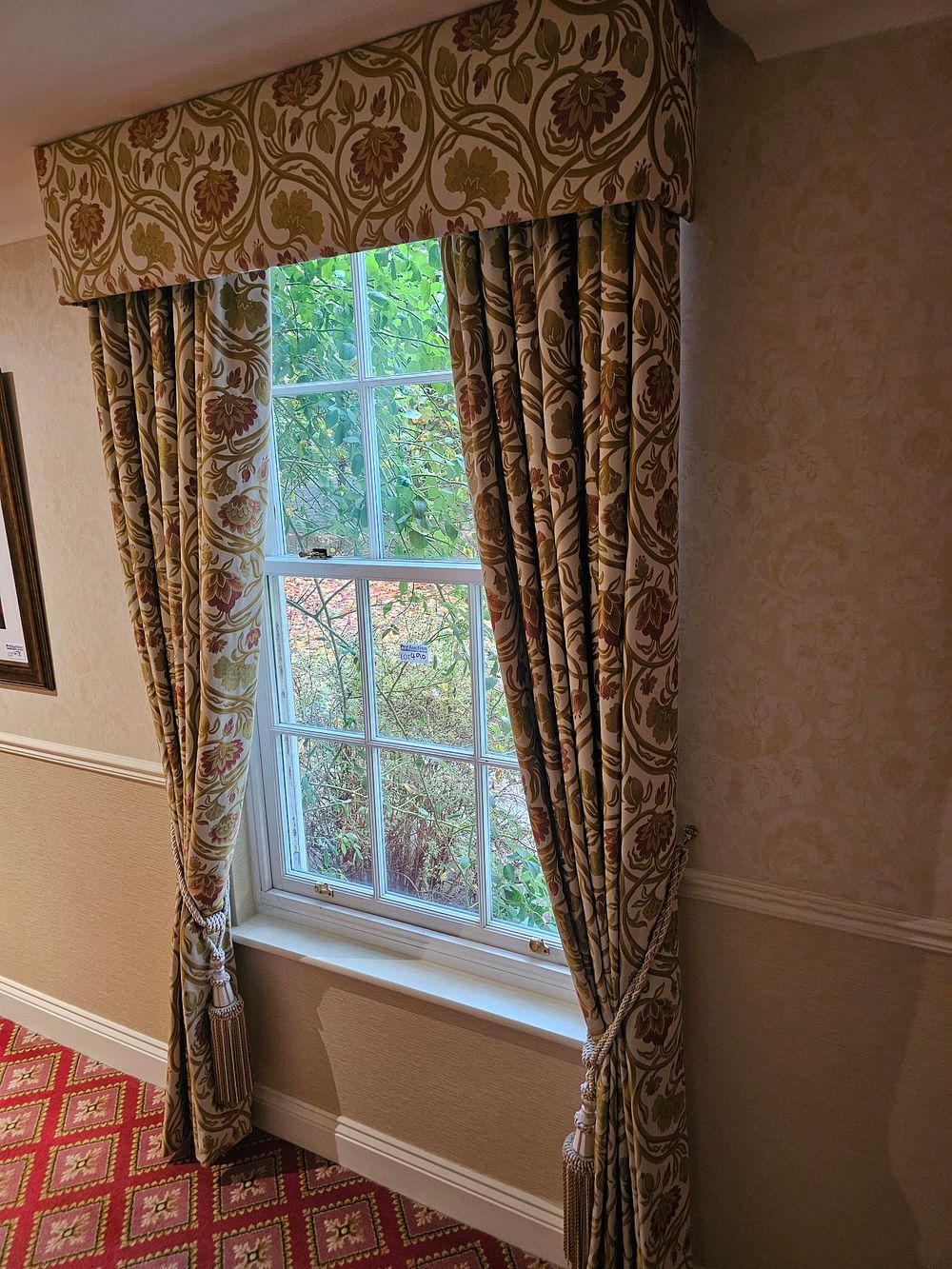 Lot 490: * A pair of fully lined cotton floral fabric drapes span 120cm x 240cm drop