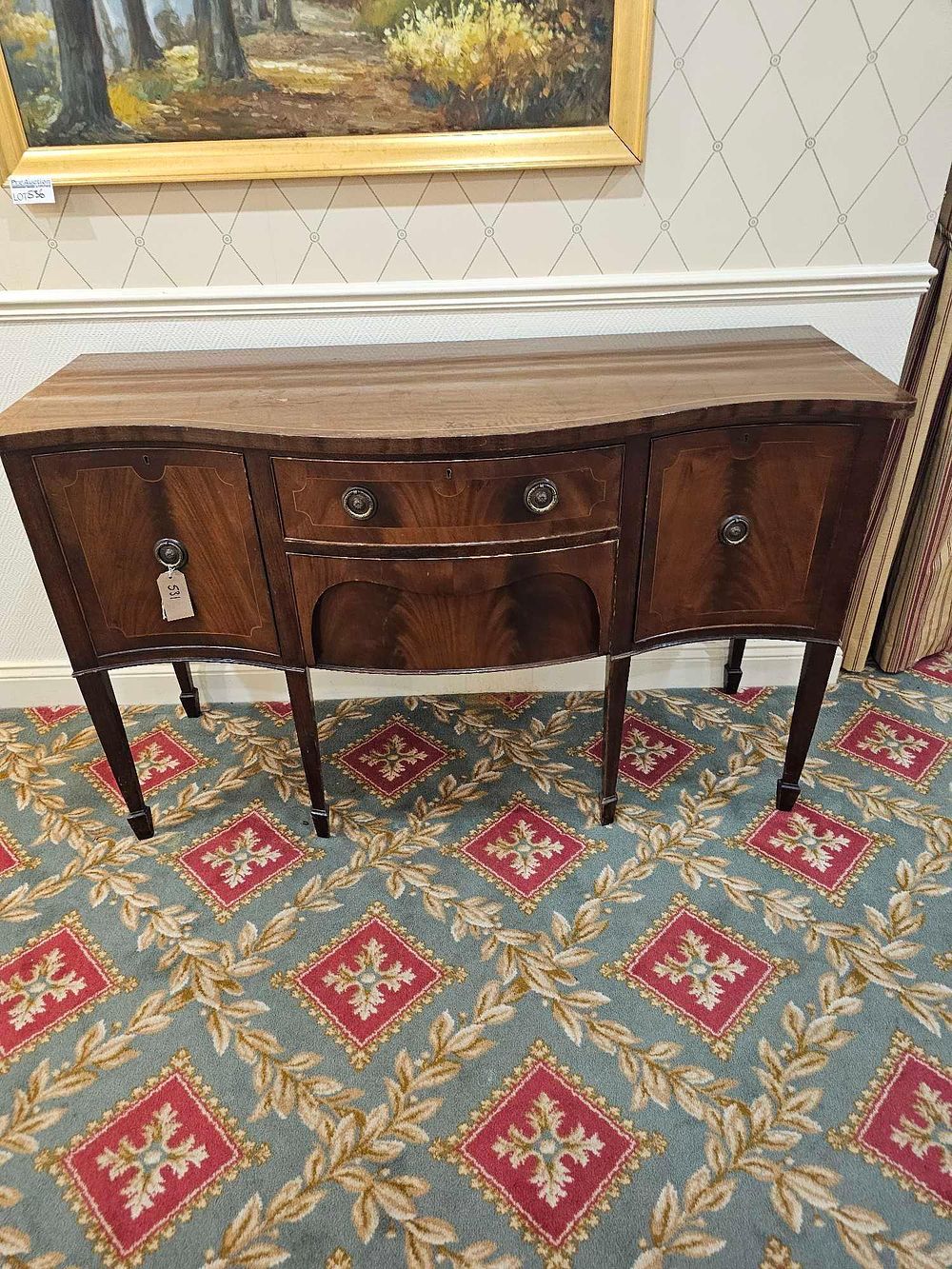 Lot 531: * A English Federal Style serpentine-front sideboard or credenza mahogany two central drawers and