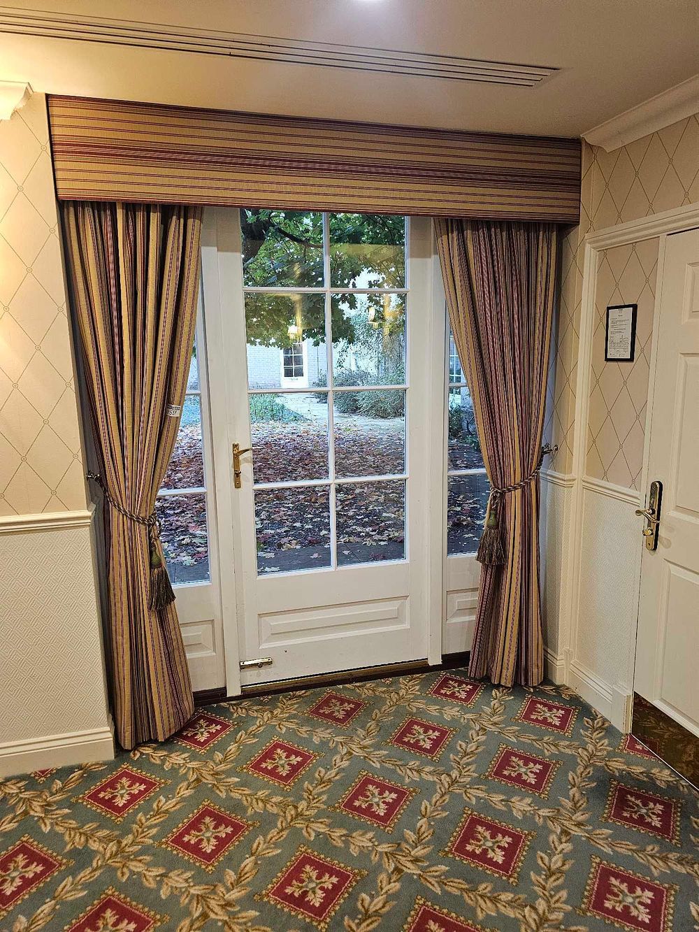 Lot 537: * A pair custom-made set of drapes features a fabric pelmet with full-length curtain panels