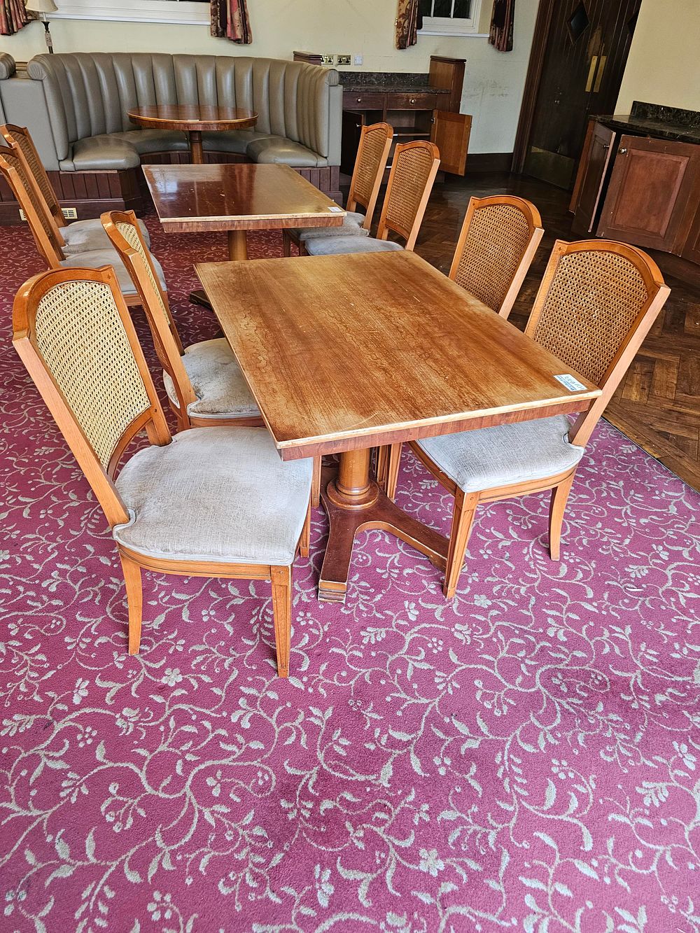 Lot 689: * A hardwood dining table on pedestal 150 x 82 x 73 complete with 4 x cane back upholstered seat pad