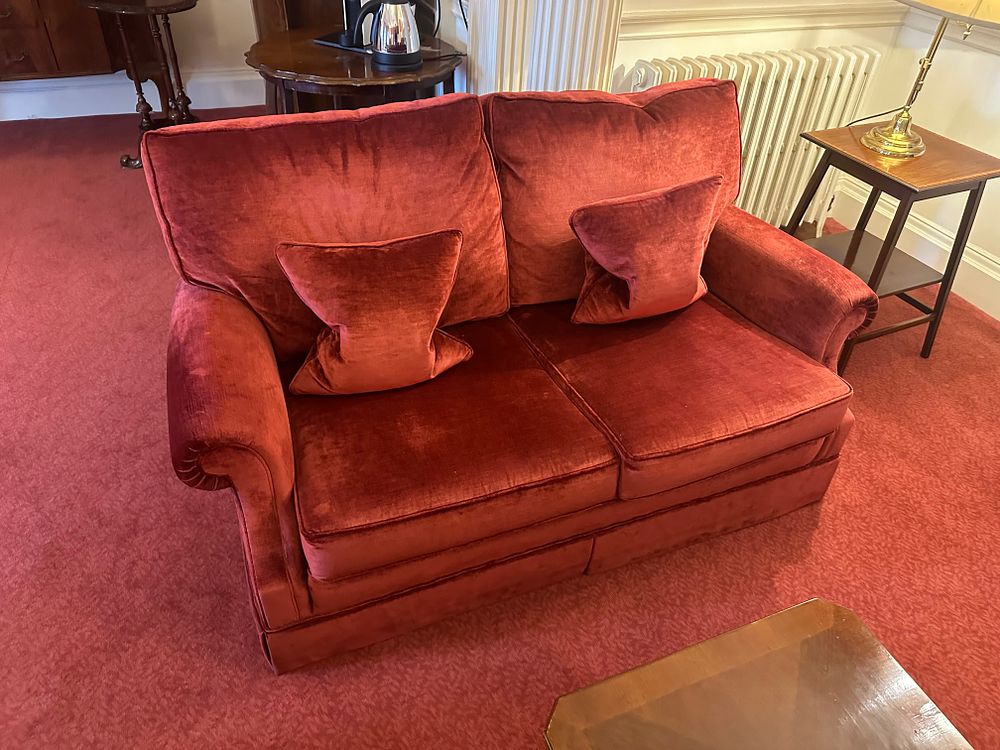 Lot 1145: * Ethan Allen Style Two-Seater Sofa in Crimson elet with Rolled Arms and Loose Cushions