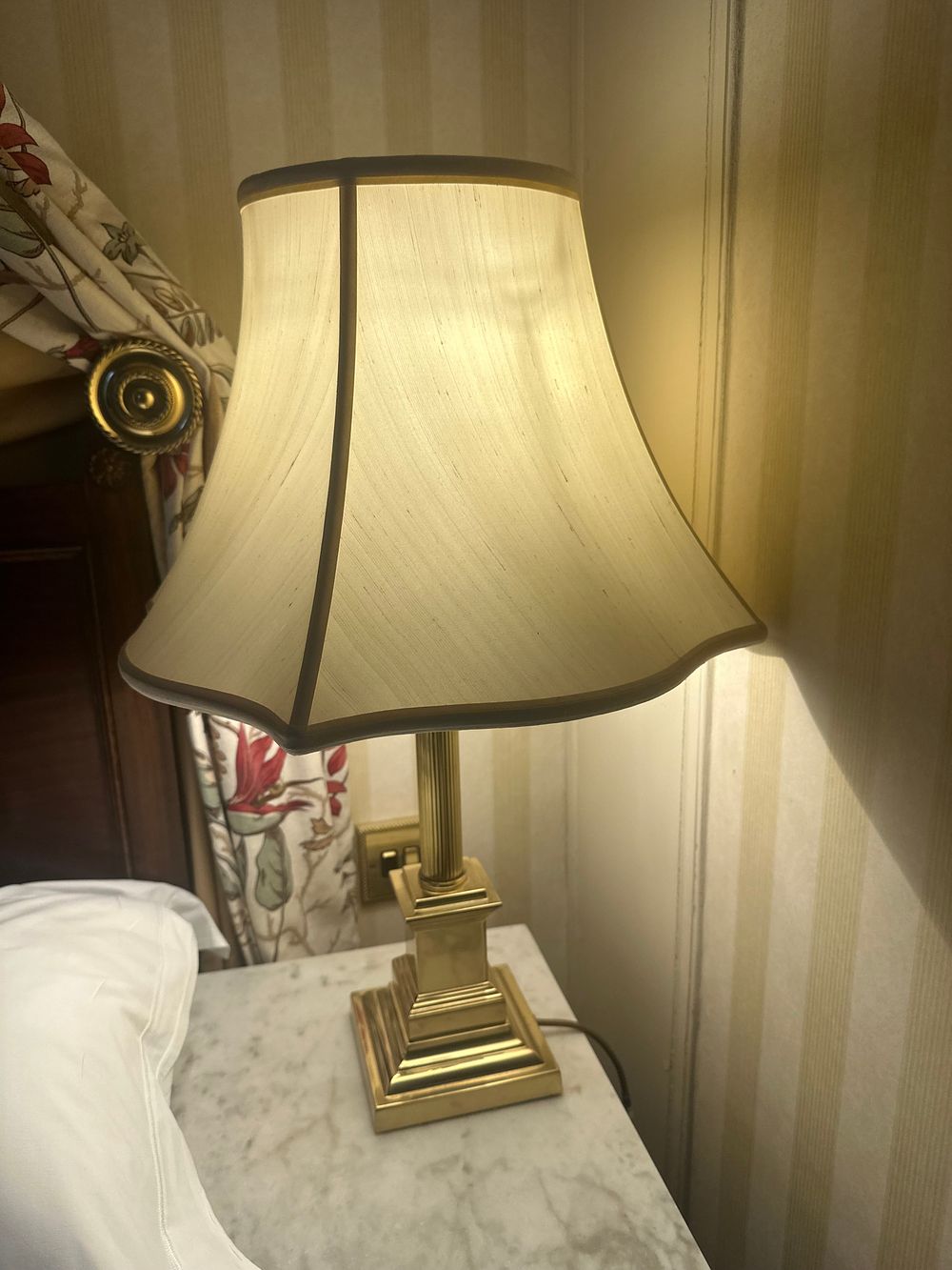Lot 1493: * Group of three Neoclassical-style brass table lamps with reeded columns and stepped bases