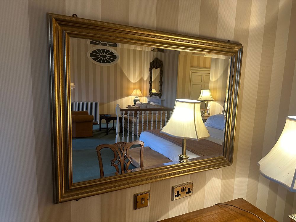 Lot 1568: * Large rectangular wall mirror with traditional gilt composite frame