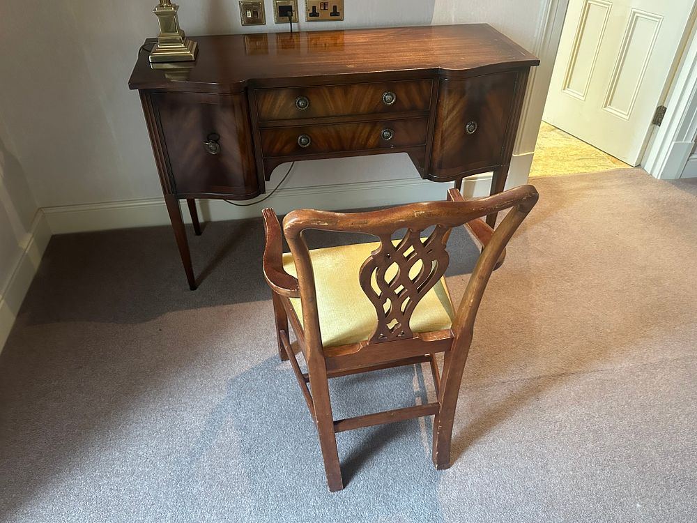 Lot 1714: * Regency Style Flame Mahogany Desk with Cared Armchair