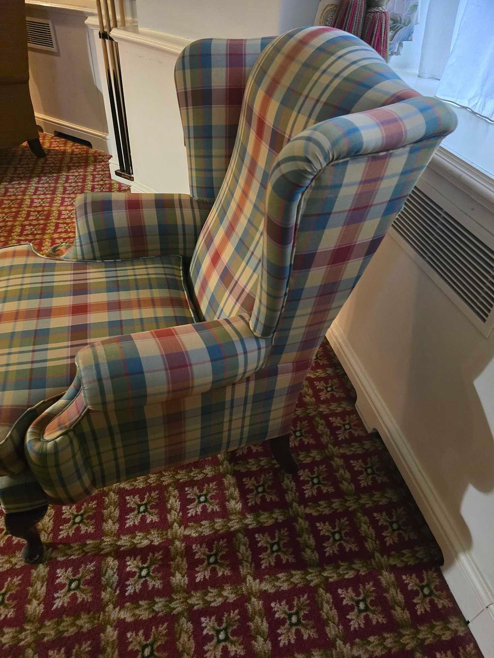 Lot 2149: * A mid-century style wingback armchair