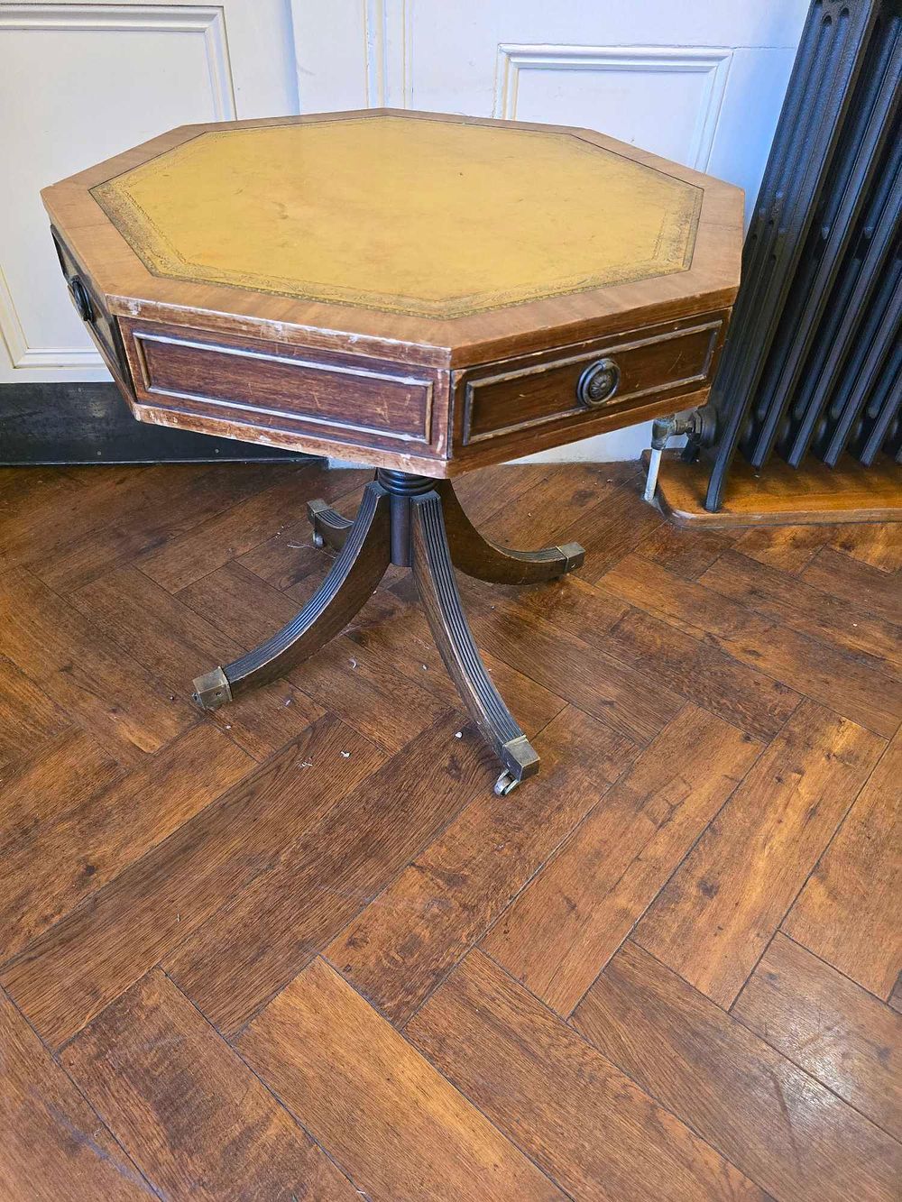 Lot 2183: * A Regency style mahogany octagonal drum table