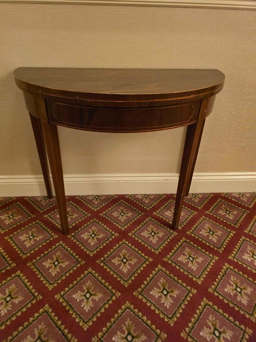 Lot 2279: * A Georgian Hepplewhite style mahogany demilune table
